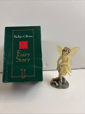 Spring Fairy" figurine from The Fairy Collection by DEZINE